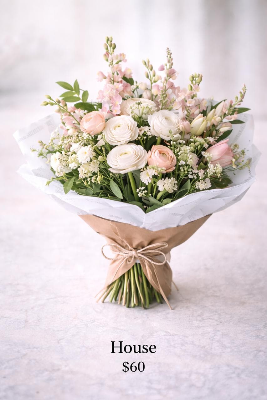 House tier bouquet with a lush premium profile and luxury wrapping.